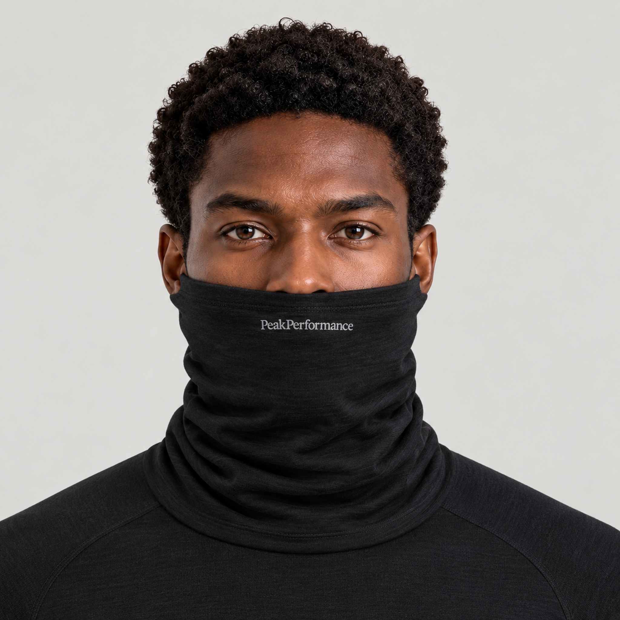 Peak Performance unisex Wool Neck Gaiter in Black – male front
