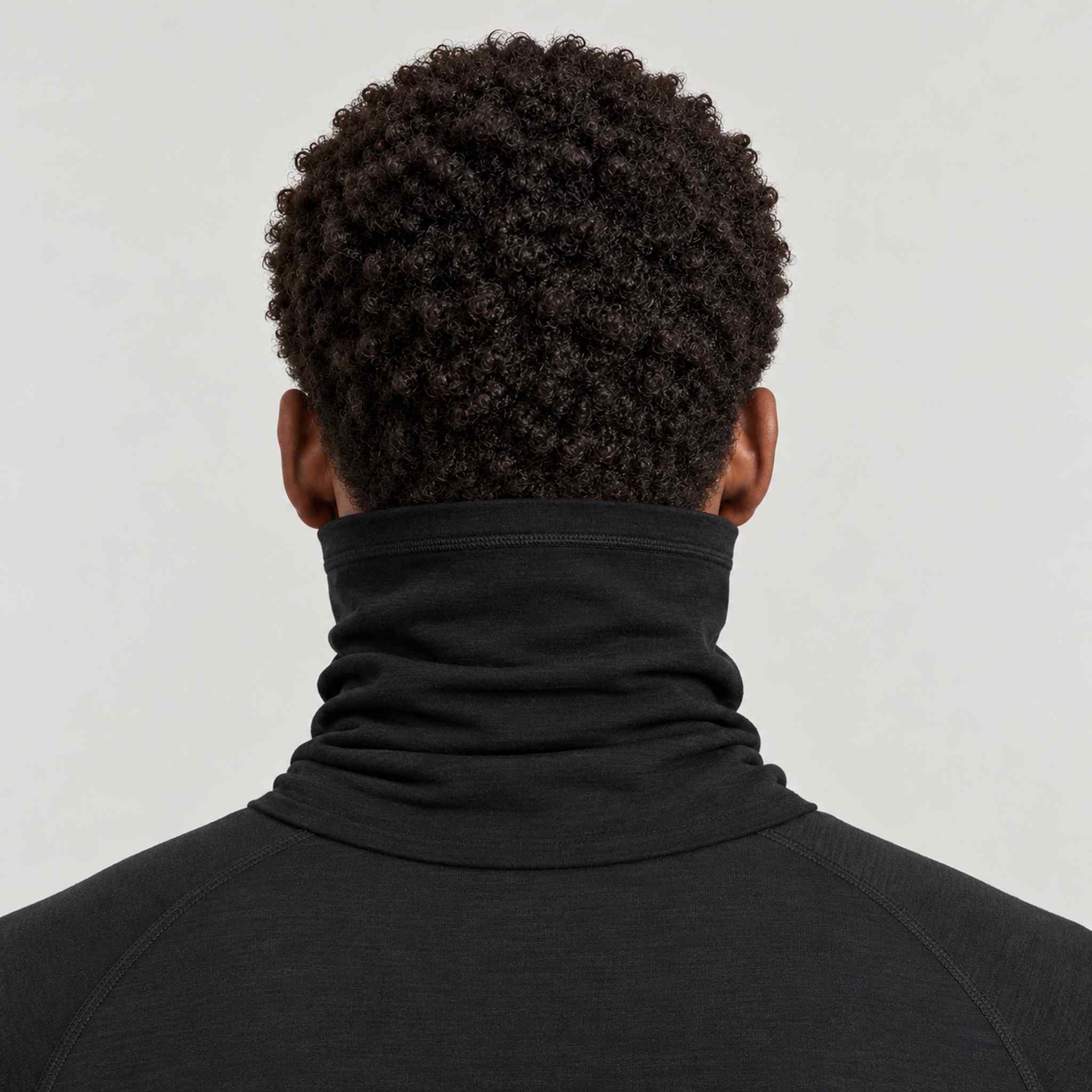 Peak Performance unisex Wool Neck Gaiter in Black – male back