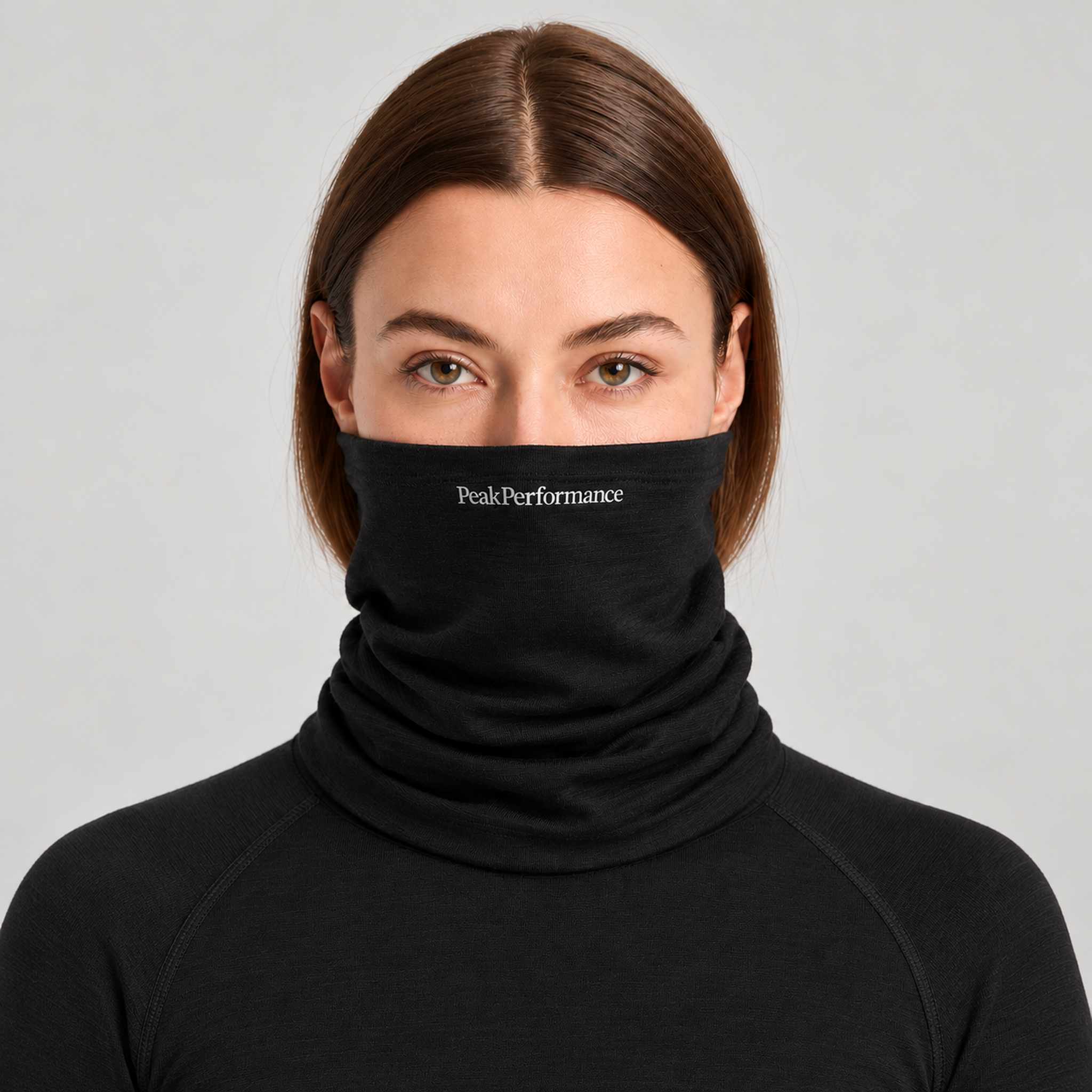 Peak Performance unisex Wool Neck Gaiter in Black – female front
