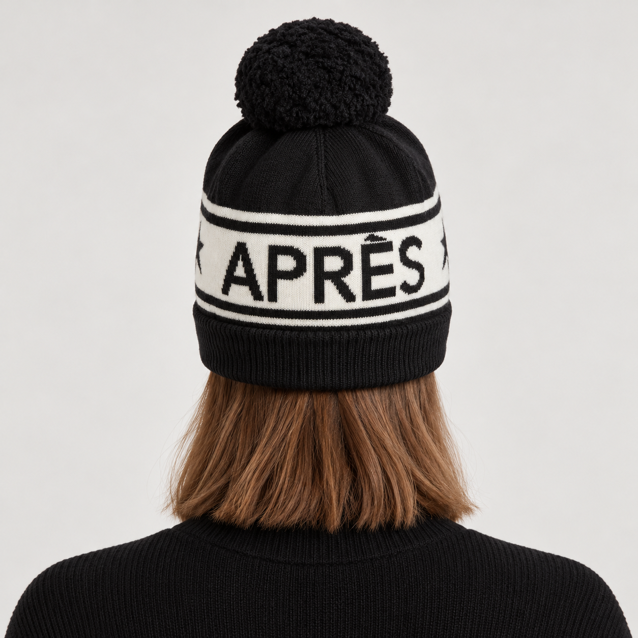 Perfect Moment unisex Schild Beanie in Black – woman back view