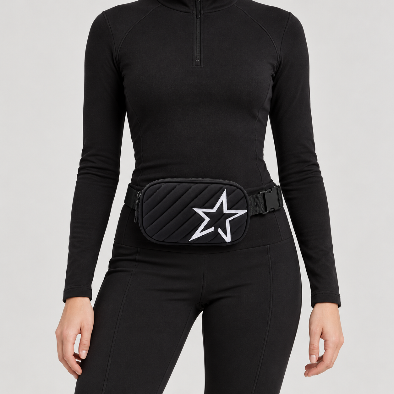 Perfect Moment unisex Star Bum Bag in Black – woman front view