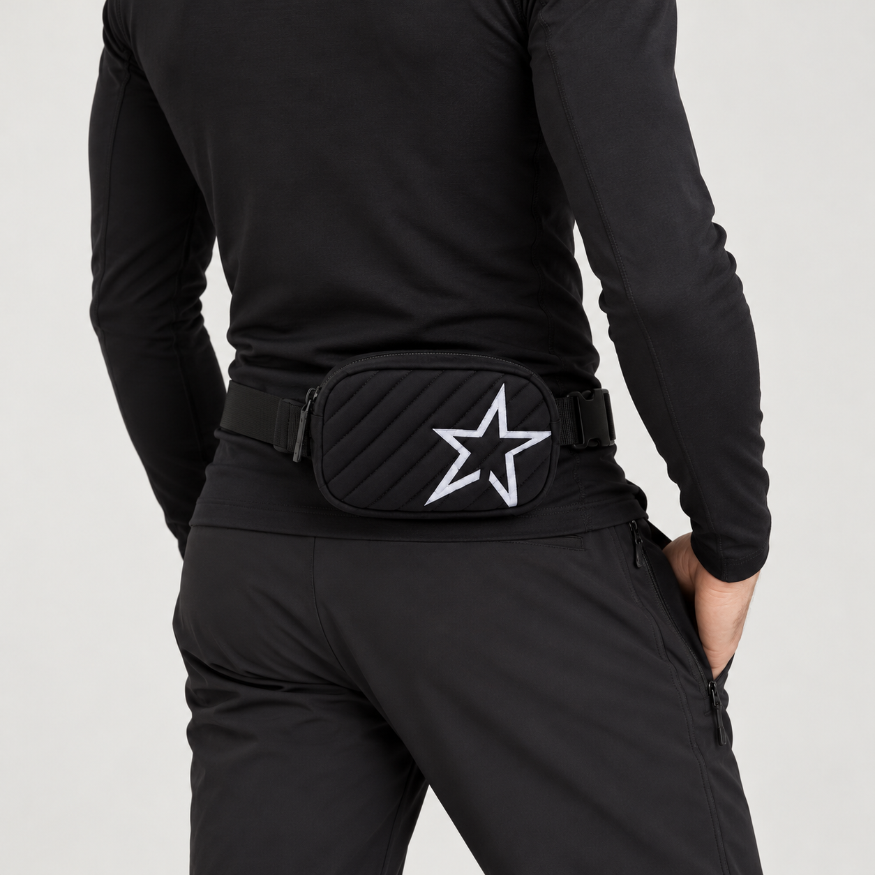 Perfect Moment unisex Star Bum Bag in Black – man rear three quarter view