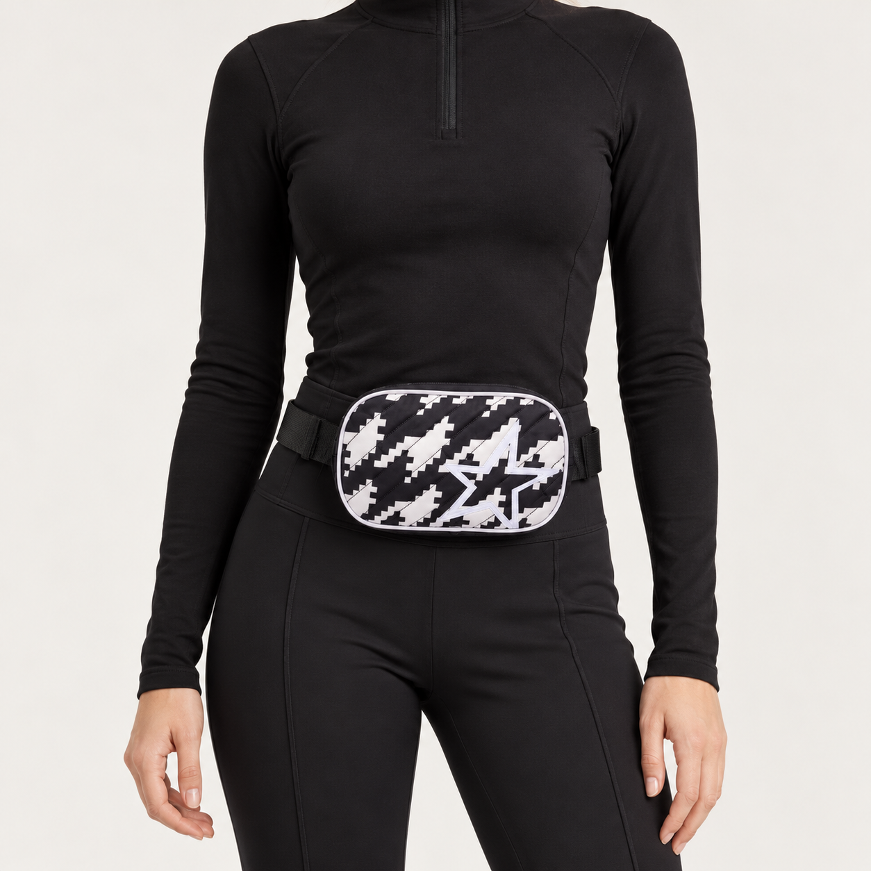 Perfect Moment unisex Star Bum Bag in Houndstooth – woman front view