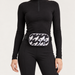 Perfect Moment unisex Star Bum Bag in Houndstooth – woman front view