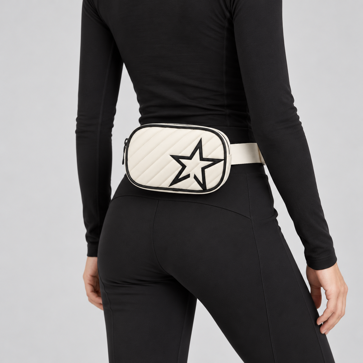 Perfect Moment unisex Star Bum Bag in Snow White – woman rear three quarter view