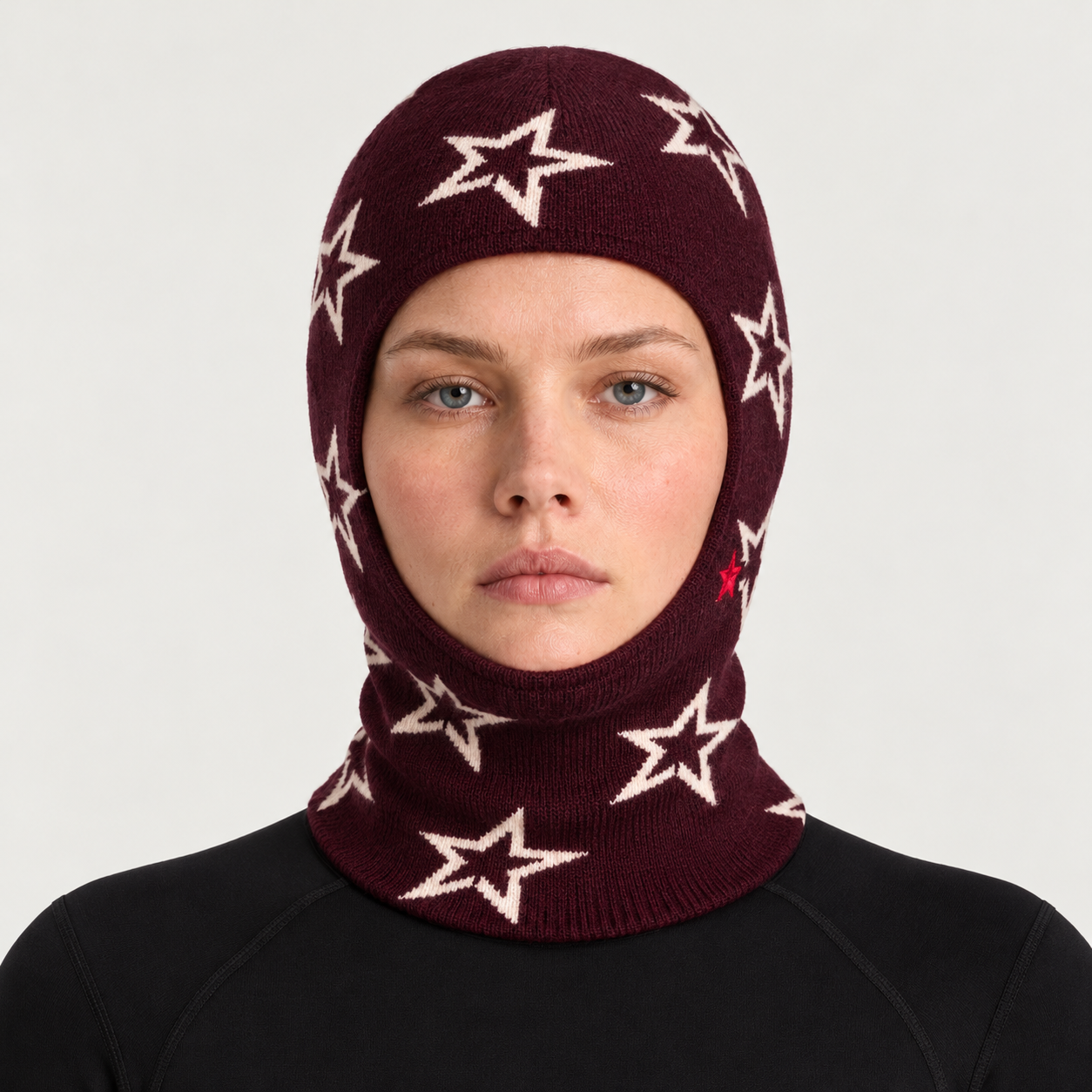 Perfect Moment Balaclava in burgundy with cream stars – woman front view