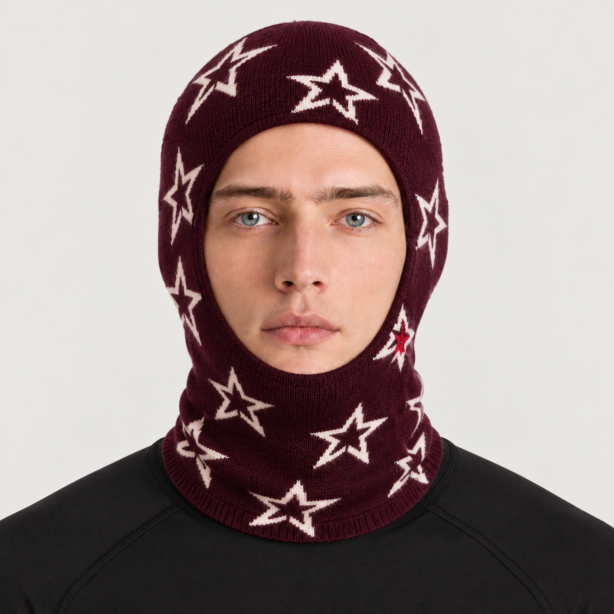 Perfect Moment Balaclava in burgundy with cream stars – man front view