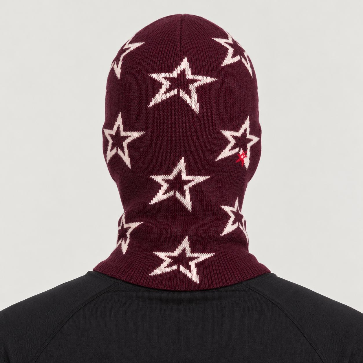 Perfect Moment Balaclava in burgundy with cream stars – man back view