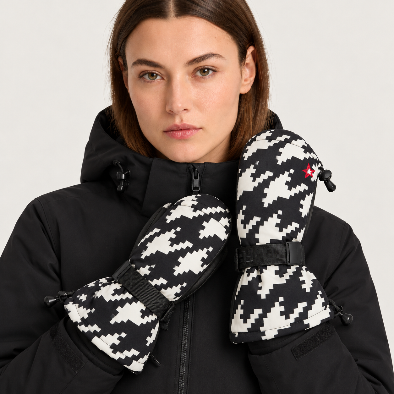 Perfect Moment Davos Mitts in black and white houndstooth – woman front view