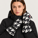 Perfect Moment Davos Mitts in black and white houndstooth – woman front view