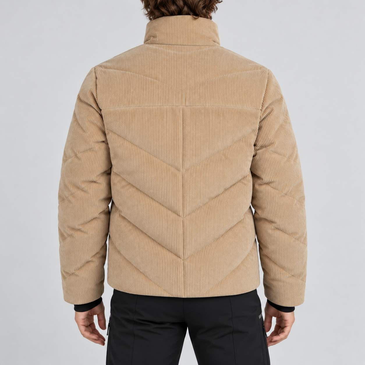 Perfect Moment men’s Chevron Quilted Cord Ski Jacket in Camel Cord – model back view