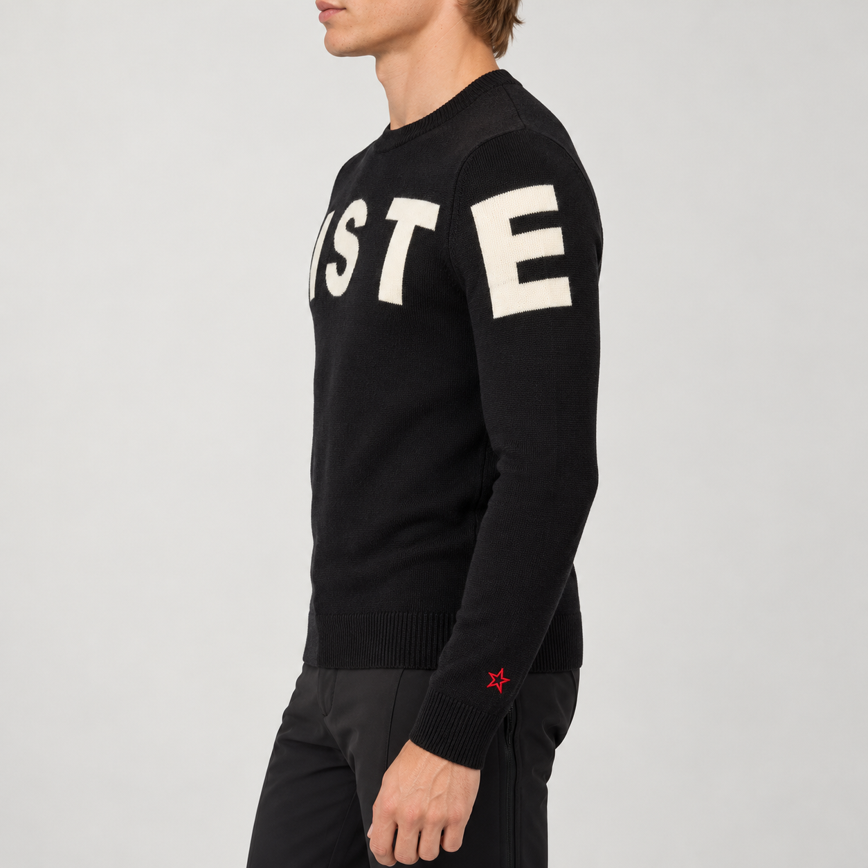 Perfect Moment men’s Piste II Sweater in Black – model side view