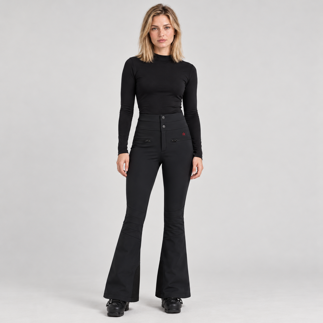 Perfect Moment women’s Aurora High Waist Flare Pant in Black – model front view