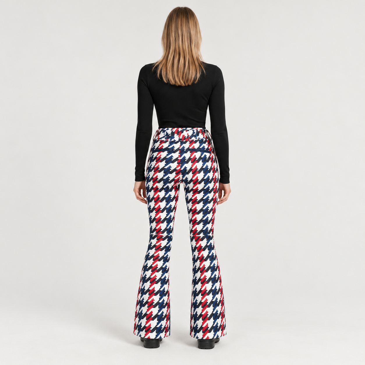 Perfect Moment women’s Aurora High Waist Flare Pant in Houndstooth – model back view