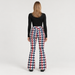 Perfect Moment women’s Aurora High Waist Flare Pant in Houndstooth – model back view