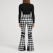 Perfect Moment women’s Aurora High Waist Flare Pant in Houndstooth Black/White – model back view
