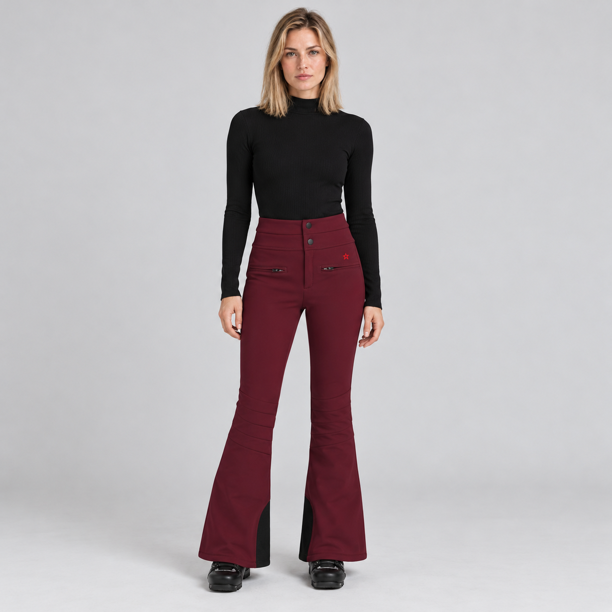 Perfect Moment women’s Aurora High Waist Flare Pant in Wine – model front view