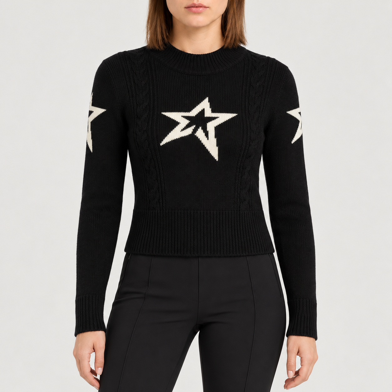 Perfect Moment women’s Cable Sweater in Black – model front view