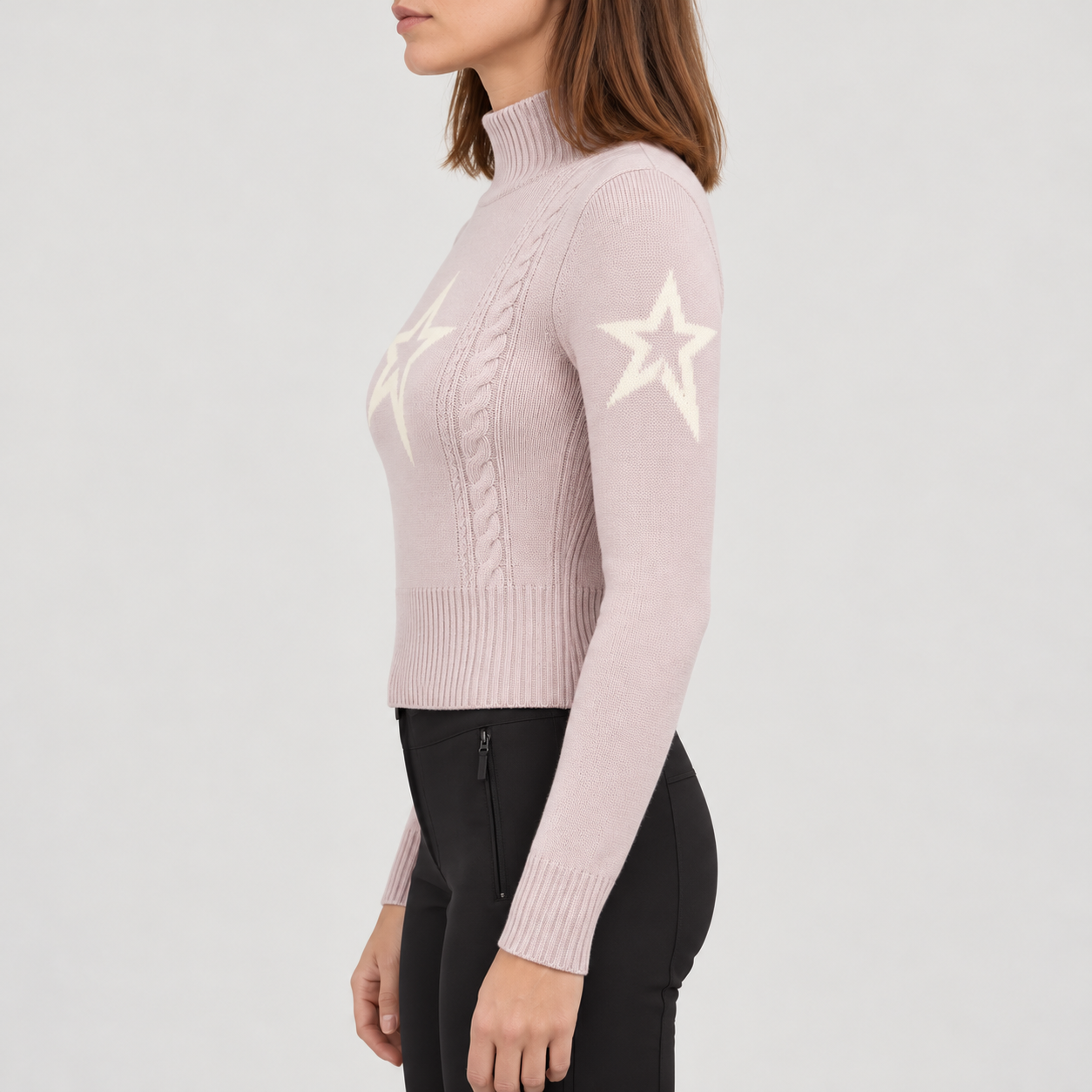 Perfect Moment women’s Cable Sweater in Oyster Pink – model side view