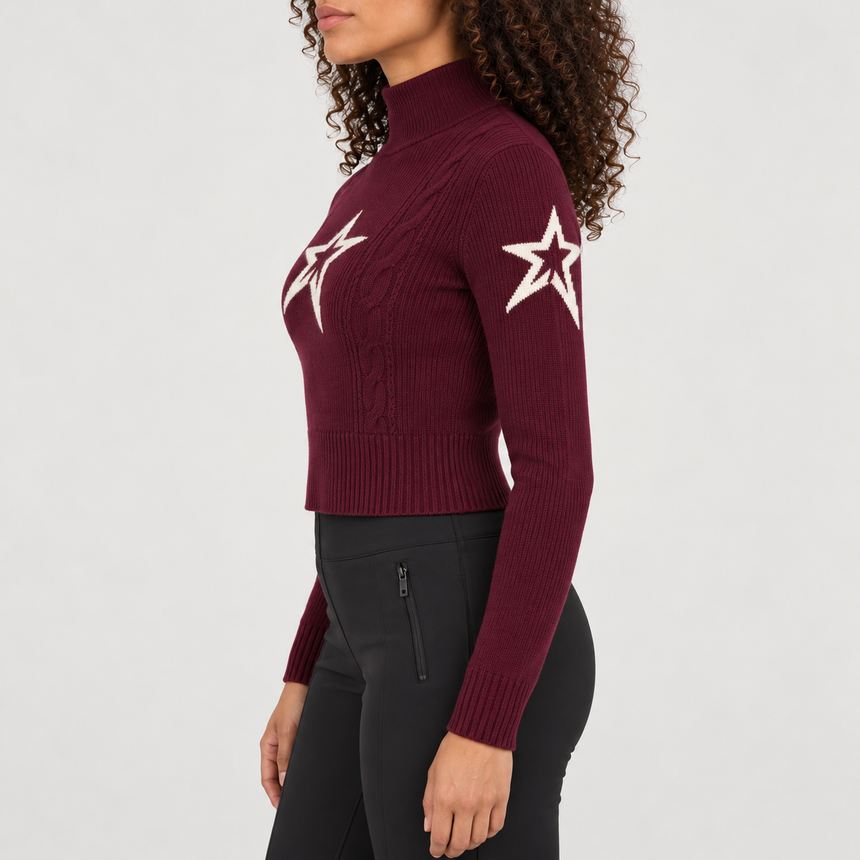 Perfect Moment women’s Cable Sweater in Wine – model side view