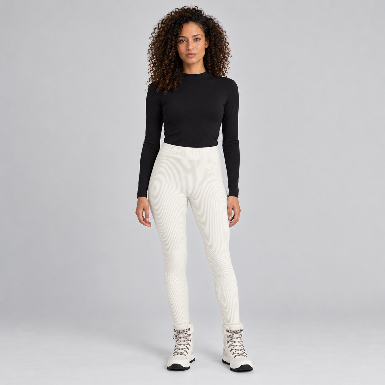 Perfect Moment women’s Chalet Baselayer Pant in Snow White – model front view