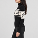 Perfect Moment women’s Chopper Sweater in Black – model side view