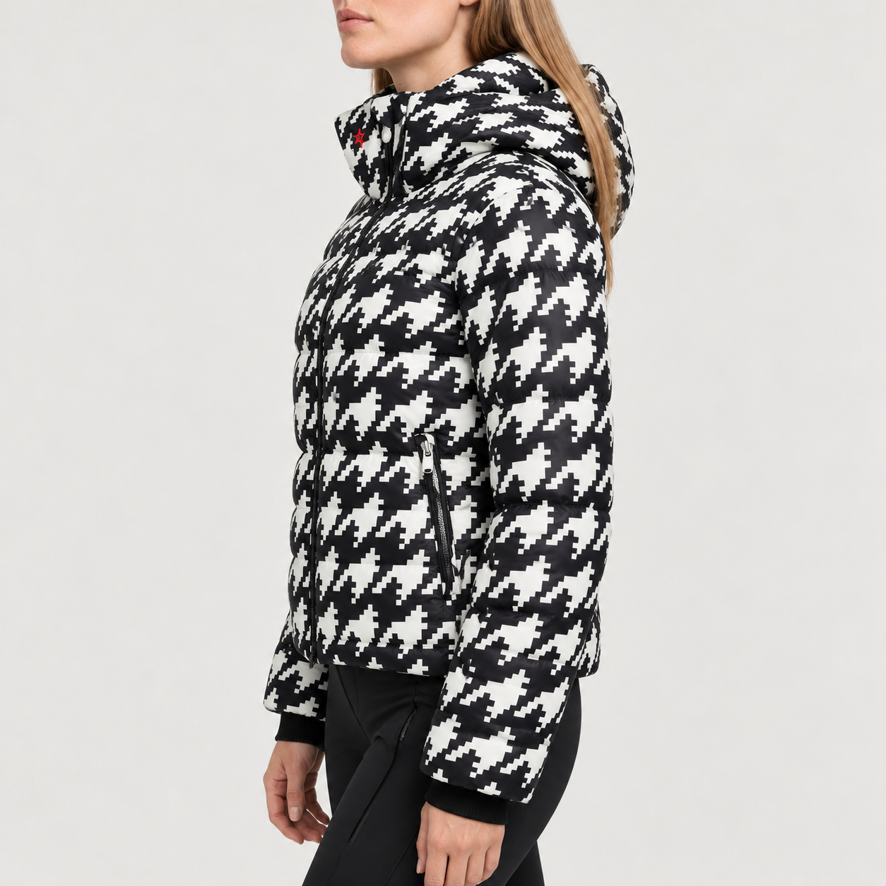 Perfect Moment women’s Polar Flare III Ski Jacket in Houndstooth – model side view