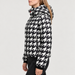 Perfect Moment women’s Polar Flare III Ski Jacket in Houndstooth – model side view