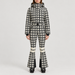 Perfect Moment women’s Polar Flare Ski Suit in Houndstooth – model front view