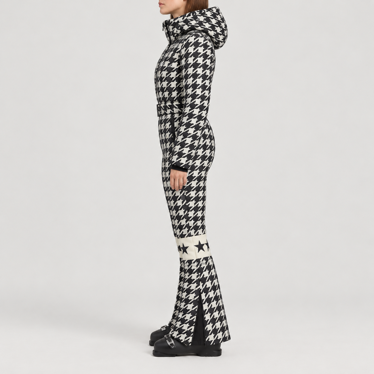 Perfect Moment women’s Polar Flare Ski Suit in Houndstooth – model side view