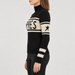 Perfect Moment women’s Schild Apres Sweater in Black – model side view
