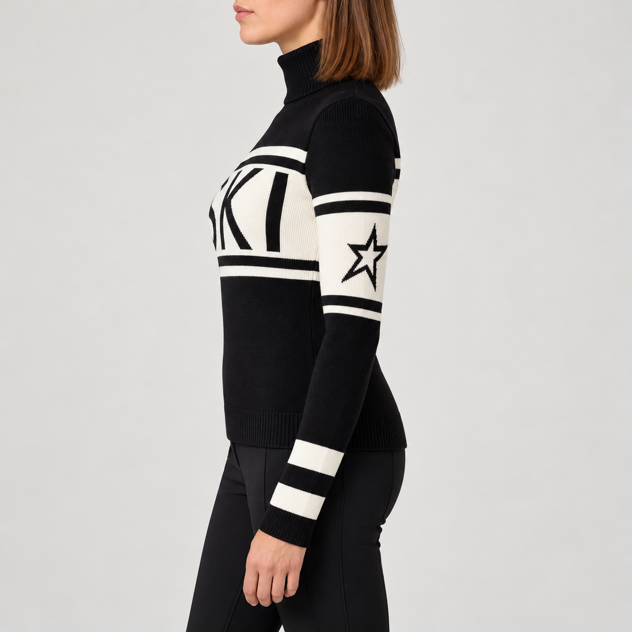 Perfect Moment women’s Schild Sweater in Black – model side view