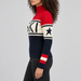 Perfect Moment women’s Schild Sweater in Red/Navy – model side view