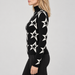 Perfect Moment women’s Star Dust Sweater in Black – model side view