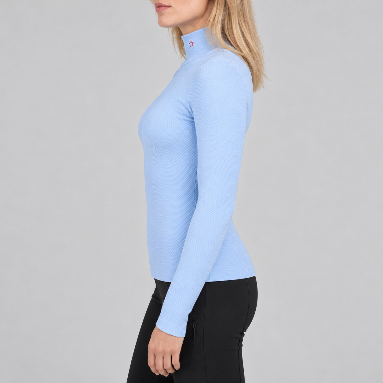 Perfect Moment women’s Thermal Top in Bluebird Blue – model side view