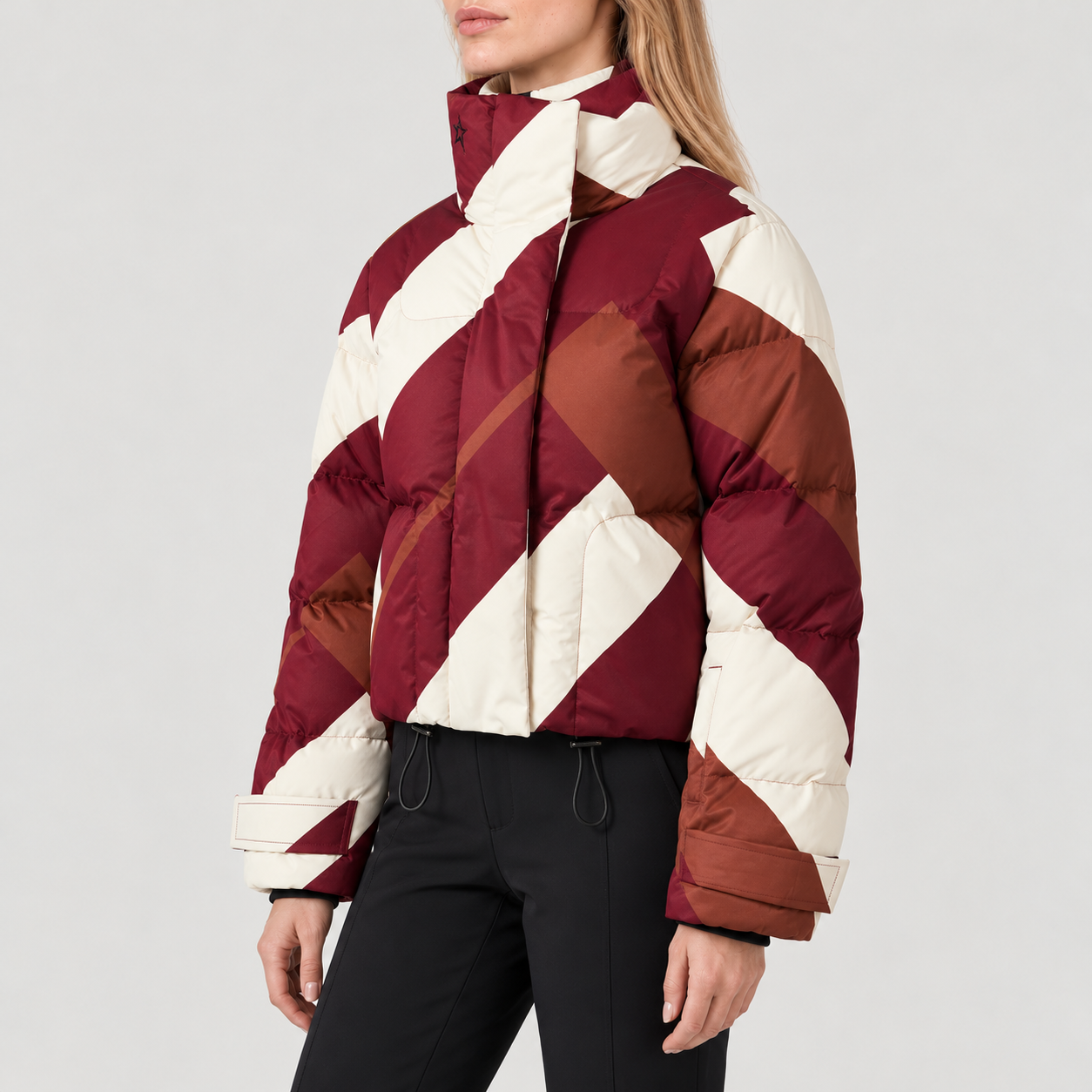 Perfect Moment women’s Astralis Ski Jacket in Chevron Wine – model side view