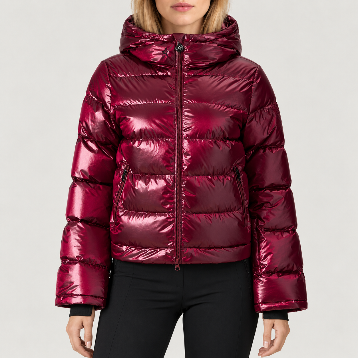 Perfect Moment women’s Polar Flare Shine Ski Jacket in wine – model front view