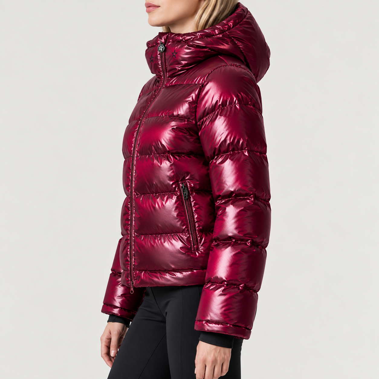 Perfect Moment women’s Polar Flare Shine Ski Jacket in wine – model side view