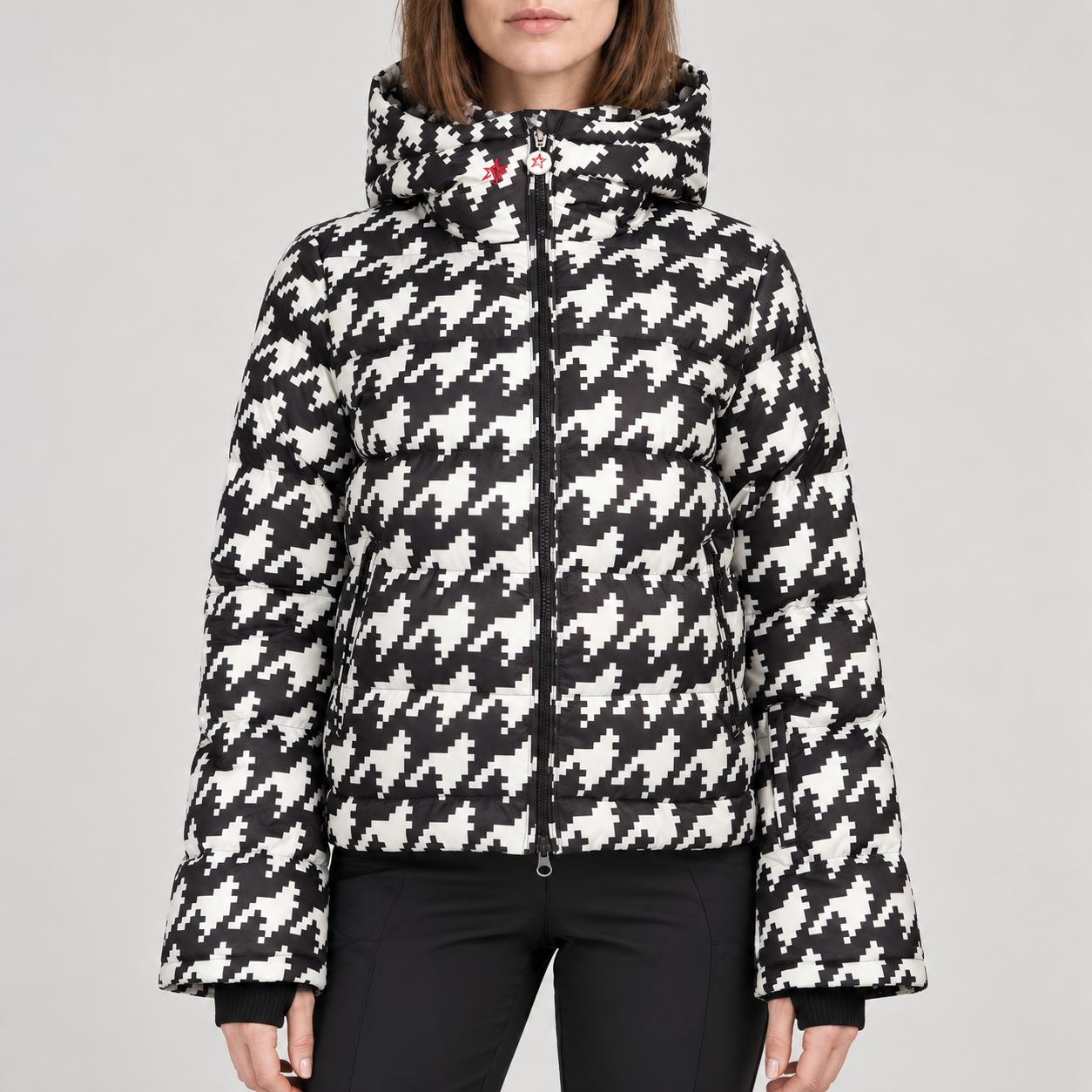 Perfect Moment women’s Polar Flare III Ski Jacket in Black and White Houndstooth – front model view