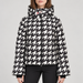 Perfect Moment women’s Polar Flare III Ski Jacket in Black and White Houndstooth – front model view