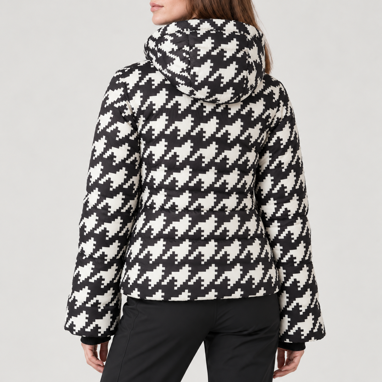 Perfect Moment women’s Polar Flare III Ski Jacket in Black and White Houndstooth – back model view