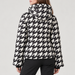 Perfect Moment women’s Polar Flare III Ski Jacket in Black and White Houndstooth – back model view