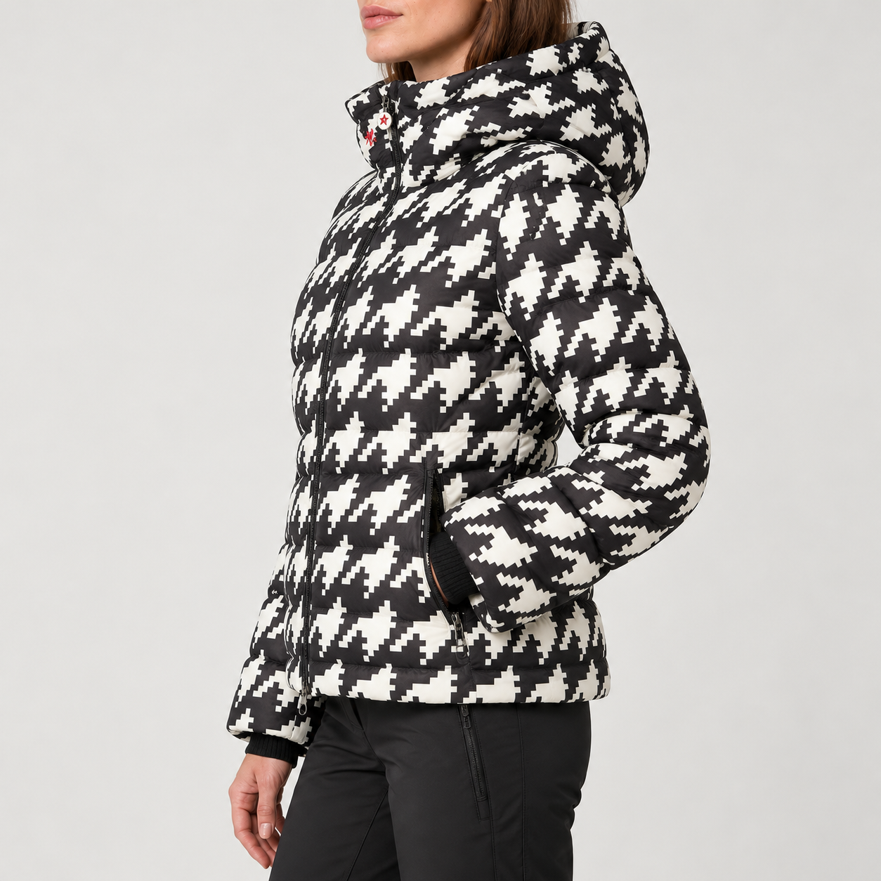 Perfect Moment women’s Polar Flare III Ski Jacket in Black and White Houndstooth – side model view