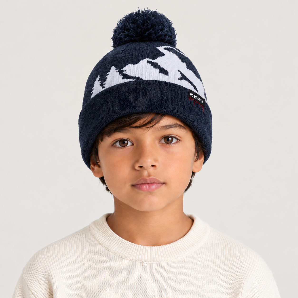 Rossignol Pompon Graphic Junior Beanie in DARK NAVY — 03 kids front view