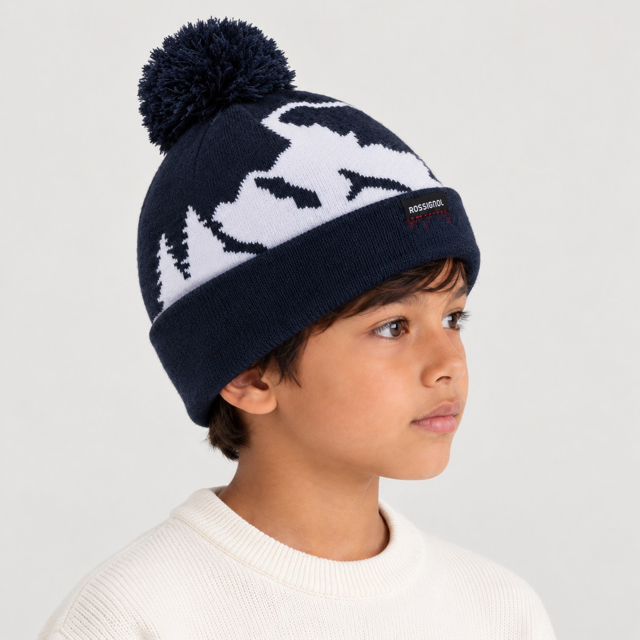 Rossignol Pompon Graphic Junior Beanie in DARK NAVY — 05 kids side view