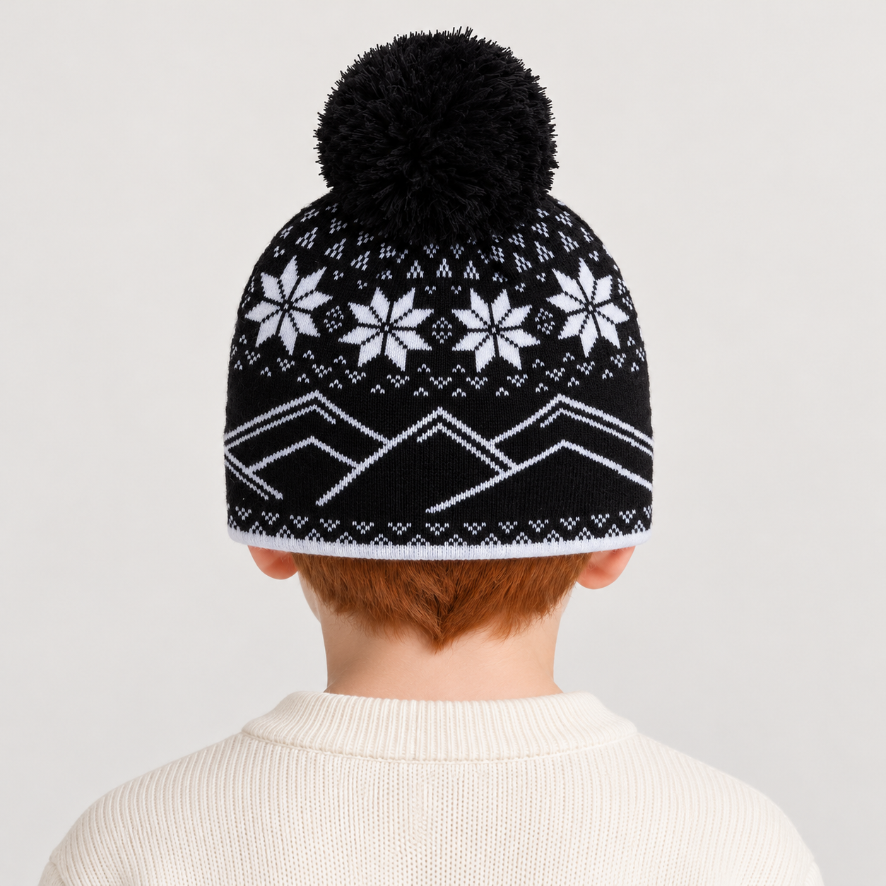 Rossignol Pompon Junior Beanie in BLACK — 04 kids back view