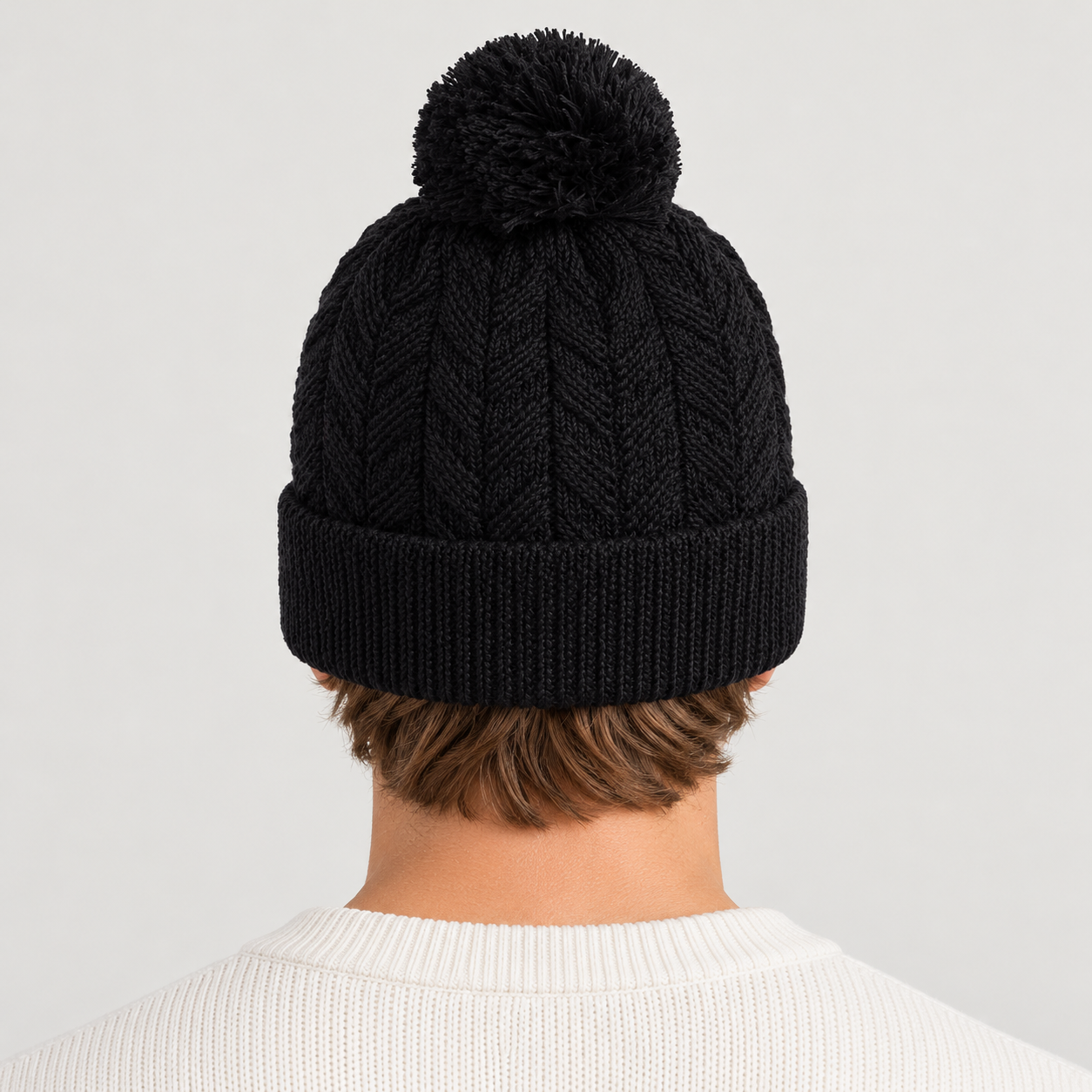 Rossignol Sofia Beanie in BLACK — 04 men back view
