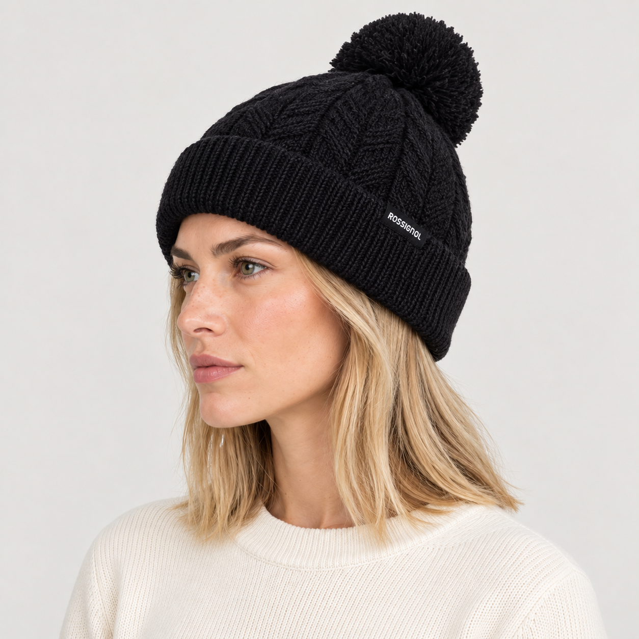 Rossignol Sofia Beanie in BLACK — 08 women side view
