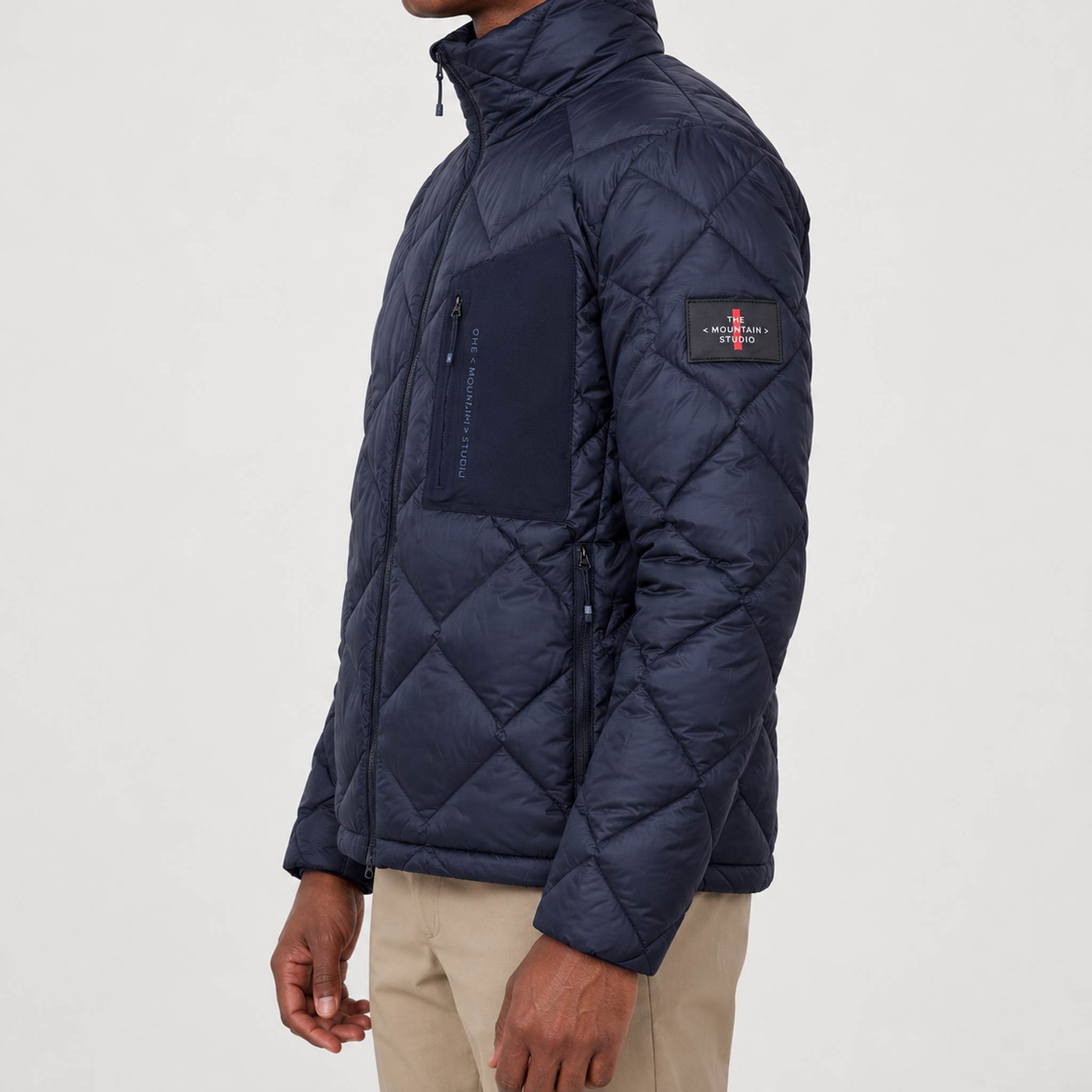 The Mountain Studio Ultralight Down Jacket — sky captain — model side