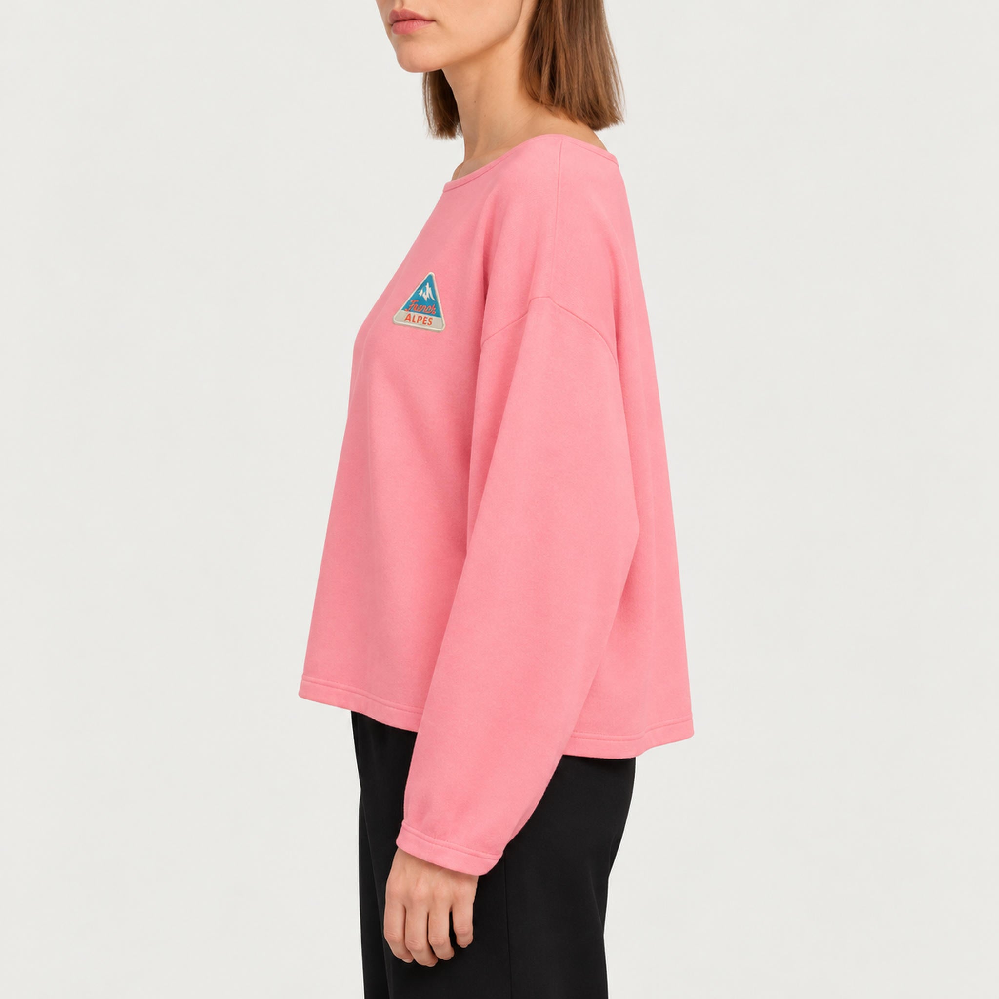 French Disorder women Alpes Patch Sweater in Bubblegum - model side | London Ski Co